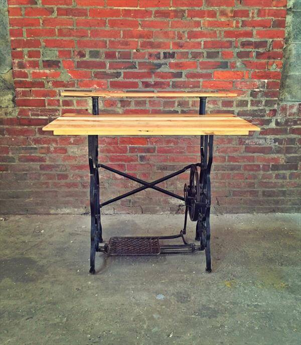 wooden pallet desk with vintage sewing machine base