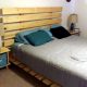 wooden pallet bed with cushion