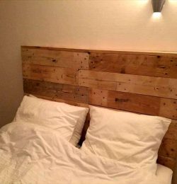 Wooden pallet bed with headboard