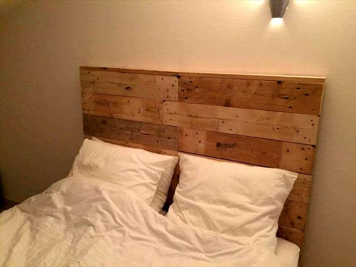 Wooden pallet bed with headboard