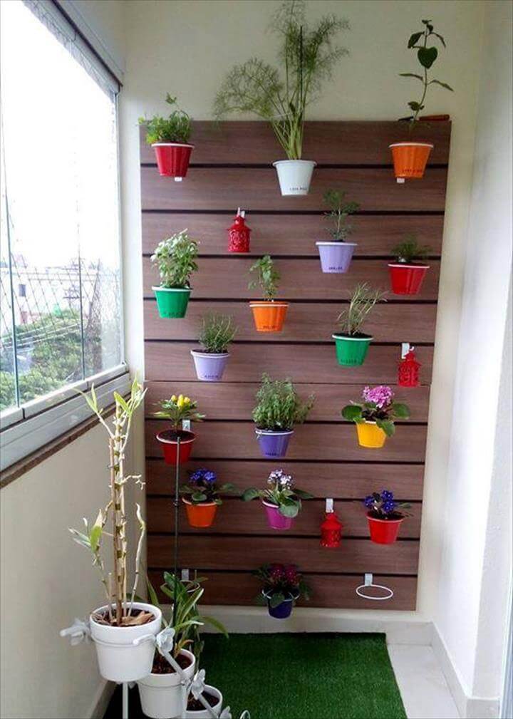 pallet and tiny buckets wall hanging garden