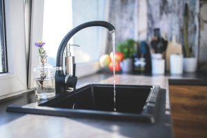 How to Install an Under Sink Water Filter in Your Kitchen Sink Cabinet